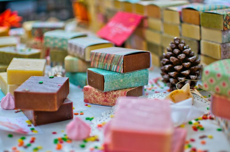 Colأوful handmade soap bars stacked